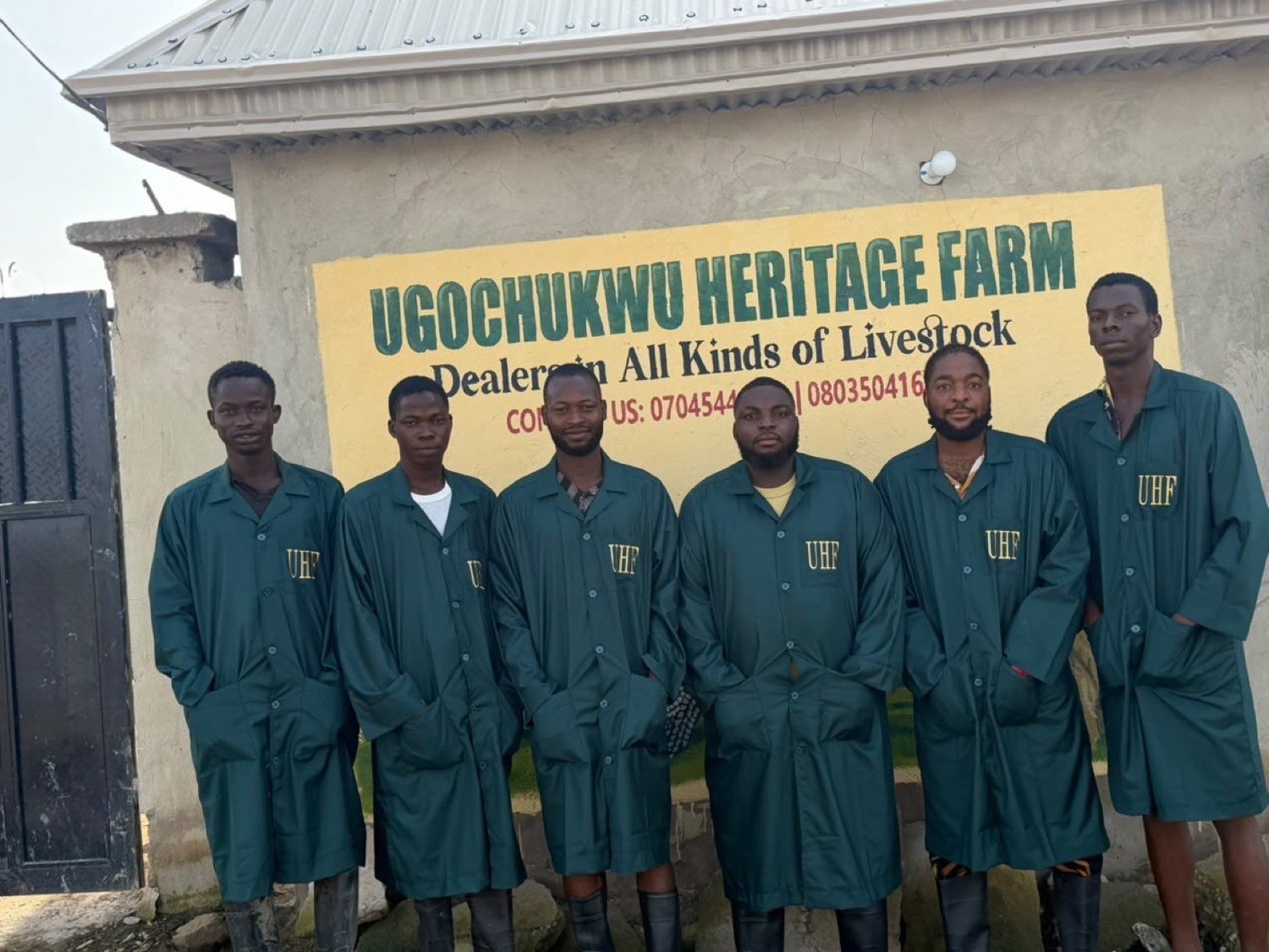 The Ugo Heritage Farm team at the farm entrance